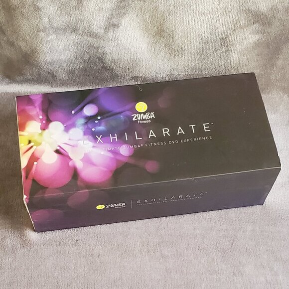 Zumba Fitness Exhilerate Workout 7 DVD Set with Toning Sticks - Picture 2 of 7